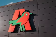 GDYNIA, POLAND - SEPTEMBER 29, 2022Auchan logo on a shopping centre wall