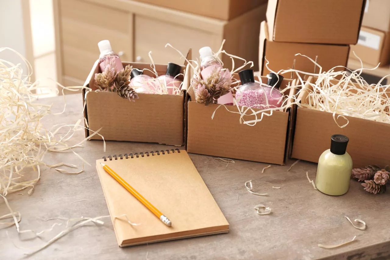 Preparing parcels for shipment to customer on table